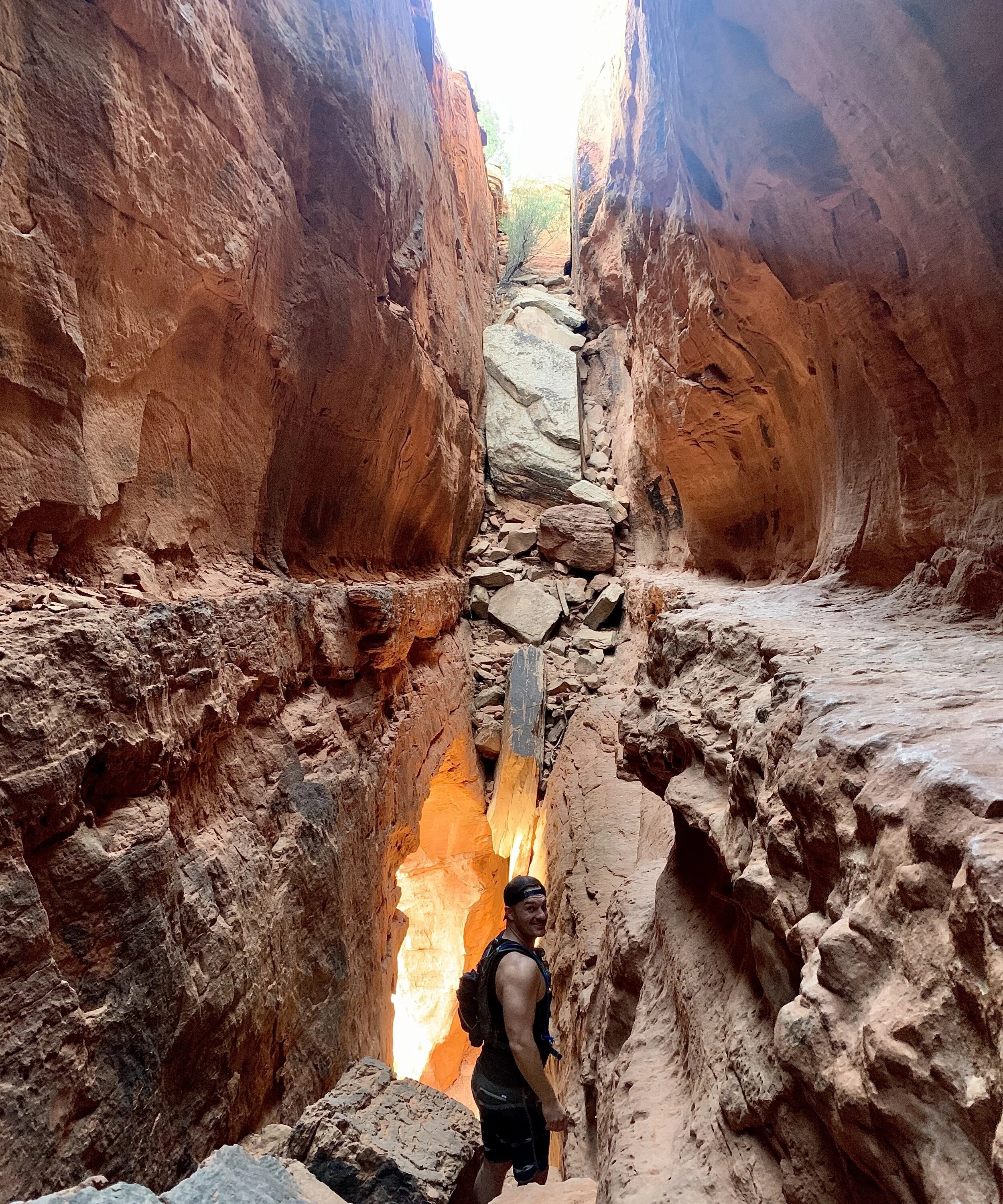 Evan Larkin exploring a slot canyon
